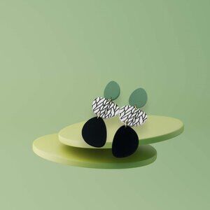 Black, white, and green leaf drop earrings